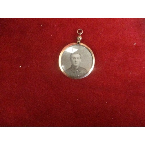 56 - ROLLED GOLD LOCKET WITH WW1 SOLDIER PHOTOGRAPHS