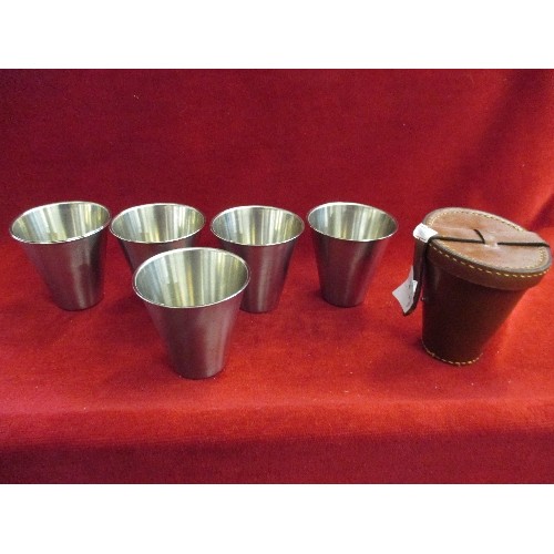 24 - SET OF 6 STAINLESS STEEL STIRRUP CUPS IN A FITTED LEATHER CASE