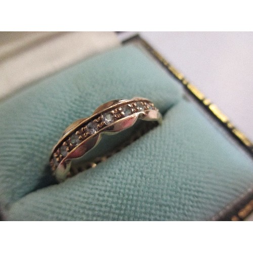 41 - A 9CT GOLD ETERNITY RING SET WITH WHITE STONES SIZE O - 2.2 GRAMS