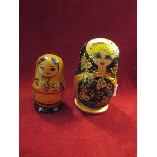 4 - 2 X RUSSIAN MATRYOSHKA NESTING DOLLS. THE LARGER ONE WITH 5 GRADUATED DOLLS, THE SMALLER ONE WITH 3 ... 