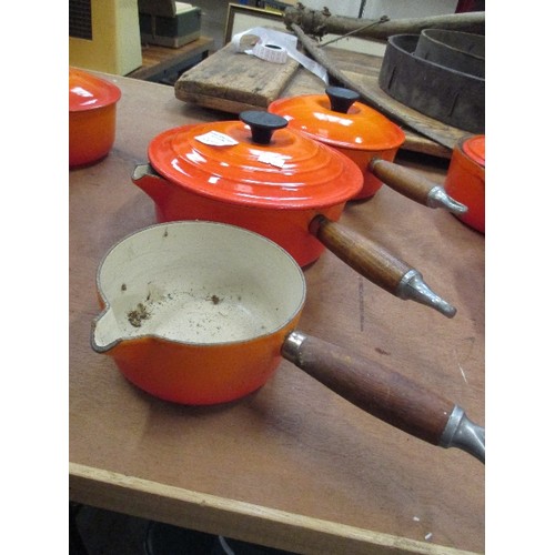 3 X LE CREUSET CAST IRON VOLCANIC ORANGE SAUCEPANS, THE LARGEST 20CM DIA