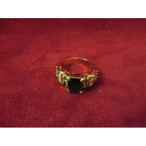 16 - EMPEROR STYLE GILT RING WITH EMERALD COLOUR STONES  - SIZE T / U