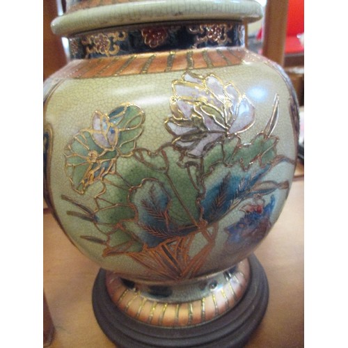 284 - CHINESE LIDDED JAR WITH RAISED GILT DETAILING & WOODEN PLINTH