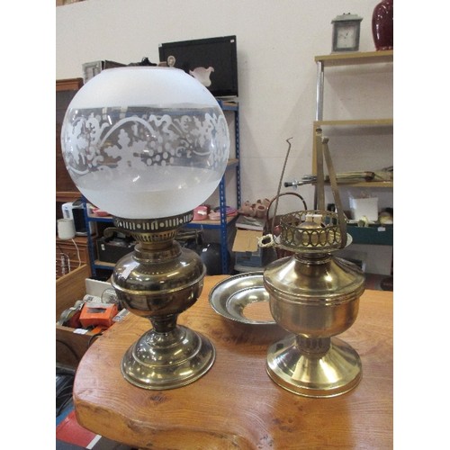 421 - 2 X BRASS PARAFFIN LAMPS, ONE WITH ETCHED GLASS SHADE