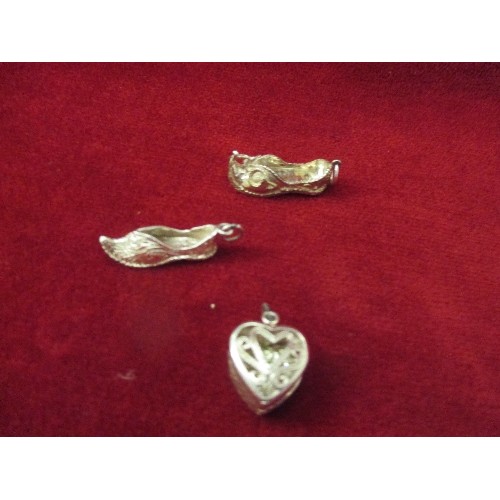 19 - COLLECTION OF SILVER CHARMS, SOME MARKED 