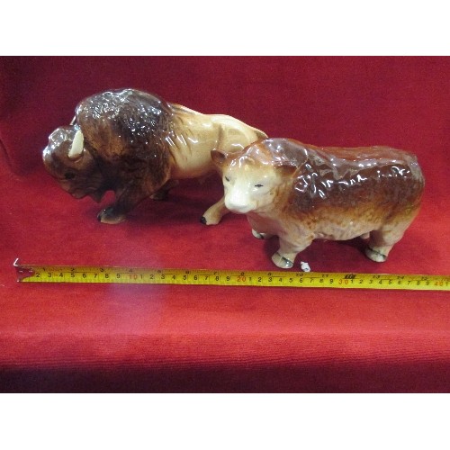 87 - A POTTERY BISON AND A HEREFORD BULL - BOTH UNMARKED