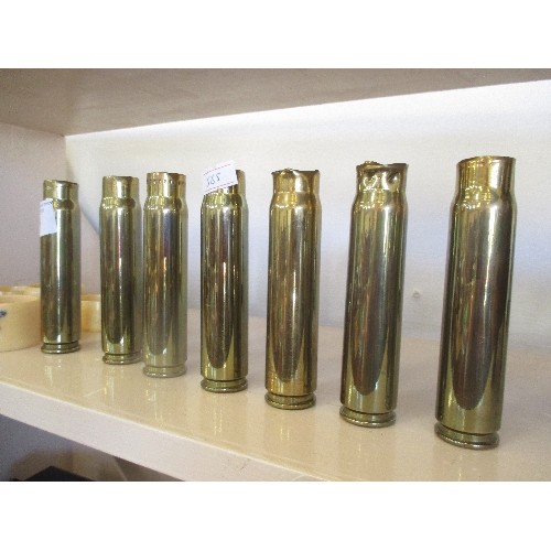 88 - 7 1940S DATED 20MM CARTRIDGE CASES