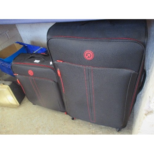 157 - SET OF 2 BLACK WHEELED SUITCASES WITH RED TRIM