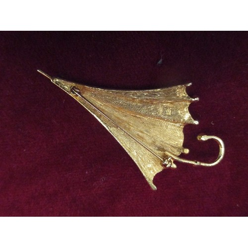 25 - VINTAGE UMBRELLA BROOCH IN GILT, SET WITH CLEAR AND COLOURED STONES - 8CM LONG - WITH BOX