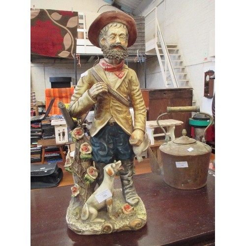 178 - LARGE POTTERY FIGURE OF HUNTER WITH HIS DOG AND GUN- 54CM HIGH