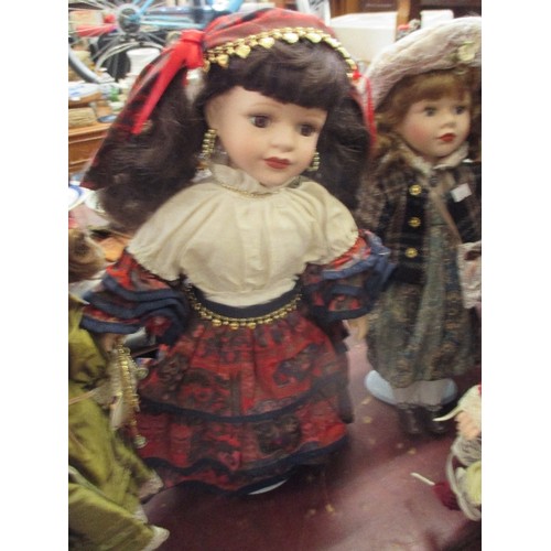 228 - 5 PORCELAIN DOLLS ON STANDS