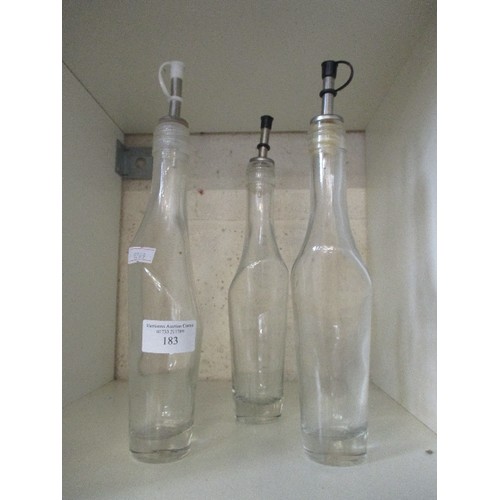 183 - TRIO OF SHAPELY VINAIGRETTE BOTTLES