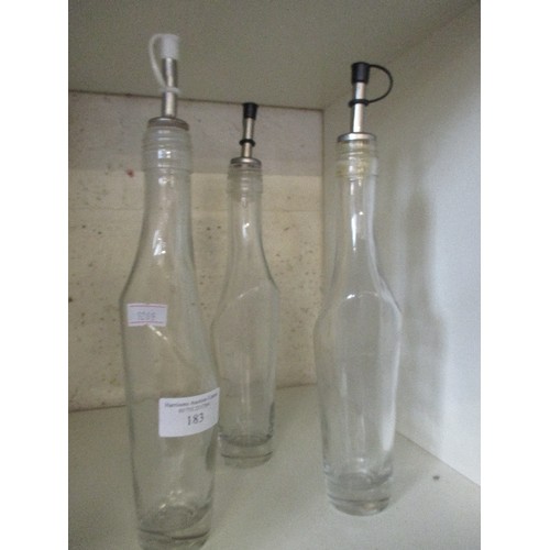 183 - TRIO OF SHAPELY VINAIGRETTE BOTTLES