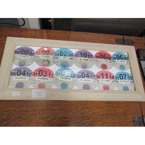 373 - RETRO FRAMED DISPLAY OF TAX DISCS - CONSECUTIVE YEARS 2004 - 2015