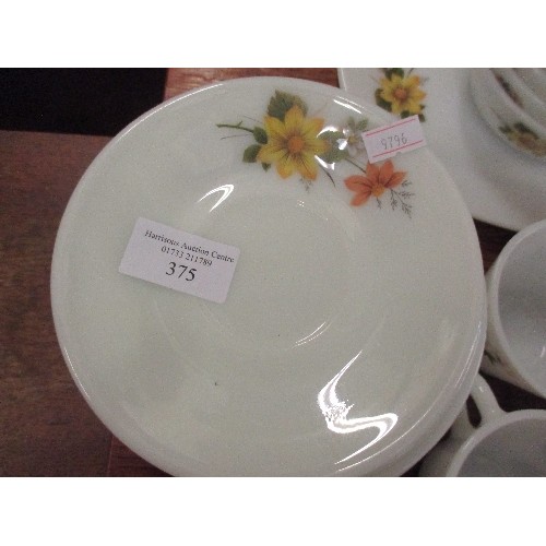 375 - VINTAGE PYREX TEASET, BOWLS AND PLATE WITH FLOWER DECORATION