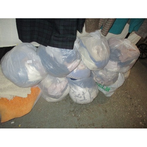 197 - 10 BAGS OF MIXED CLOTHING, RUGS ETC