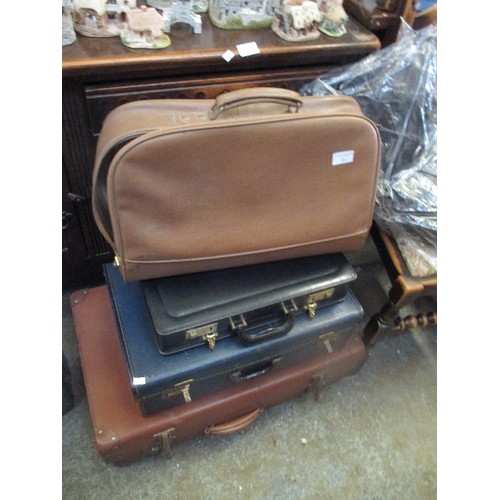 461 - 2 VINTAGE SUITCASES, A BLACK LEATHER BRIEFCASE AND A RETRO BROWN VINYL BAG