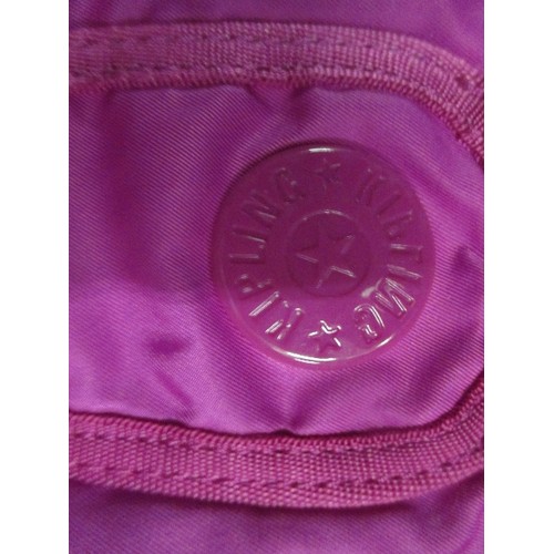 526 - A FUSCHIA PINK KIPLING DESIGNER MAKE UP BAG