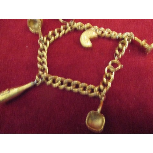 22 - GILT METAL CHARM BRACELET WITH COOKING POT, CHAMBERSTICK, SWISS CHEESE CHARMS