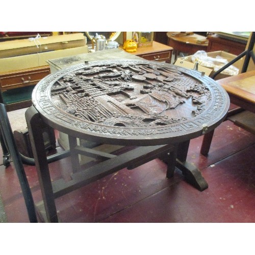 401 - 1930'S ORIENTAL HARDWOOD TABLE FIRESCREEN, THE TOP DEEPLY CARVED WITH FIGURES AND LANDSCAPE - DIA 60... 