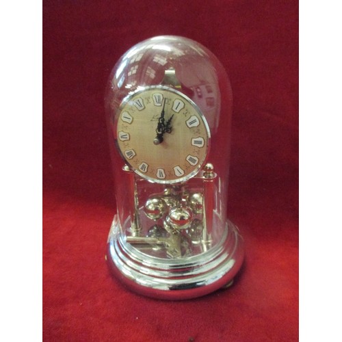 352 - A 400 DAY KERN OF GERMANY CHROME PLATED TORSION ANNIVERSARY CLOCK IN GOOD CONDITION