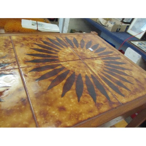 309 - MID CENTURY RETRO TEAK COFFEE TABLE WITH SUNFLOWER DESIGN TILED TOP - SLATTED MAGAZINE SHELF BELOW -... 