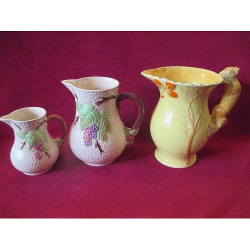 2 - ART DECO BURLEIGH WARE SQUIRREL JUG IN BRIGHT YELLOW AND ORANGE TOGETHER WITH LARGE AND SMALL WADE 