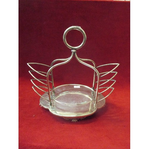 131 - VICTORIAN SILVER PLATED TOAST RACK - THE CENTRE FOR BUTTER OR PRESERVE BOWL - ON CLAW FEET