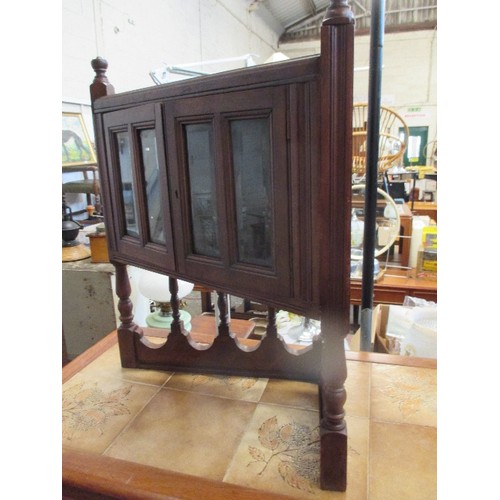 359 - EDWARDIAN SMALL CORNER CABINET, THE DOORS WITH BEVELLED GLASS, ON TURNED WOOD SUPPORTS