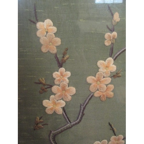 171 - EARLY 20TH CENTURY SILK EMBROIDERY OF BLOSSOM & BUTTERFLIES IN THE JAPANESE STYLE - FRAMED AND GLAZE... 