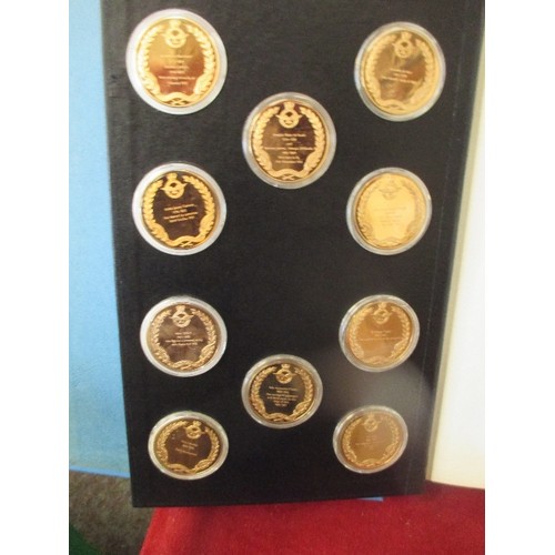 80 - A RARE SET OF 50 GOLD PLATED BRONZE MEDALLIONS EACH DEPICTING A FAMOUS EVENT WITHIN AVIATION HISTORY... 