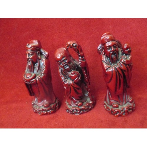 183 - 3 CHINESE IMMORTALS INCLUDING SHOULAU WITH HIS STAFF - CINNABAR LACQUER COLOUR - 14CM HIGH