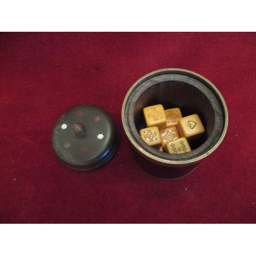 102 - VINTAGE SET OF POKER DICE IN A TURNED MAHOGANY AND BRASS BOUND BOX WITH COLOURED METAL INLAY