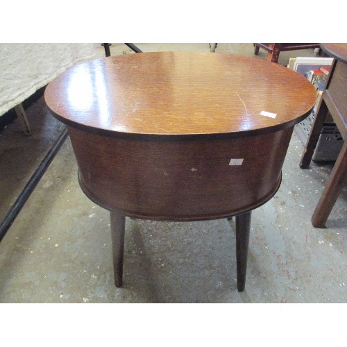 397 - 1950'S AMORCO OVAL SHAPED SEWING BOX TABLE WITH CONTENTS - ON TAPERED LEGS