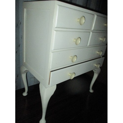 511 - 4 OVER 2 DRAWERS WHITE PAINTED CHEST ON CABRIOLE LEGS