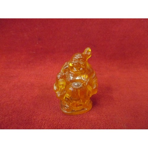 20 - 20TH CENTURY CARVED AMBER BUDDHA FIGURE - 5CM