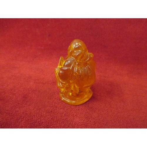 20 - 20TH CENTURY CARVED AMBER BUDDHA FIGURE - 5CM