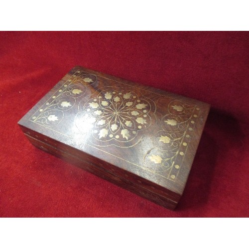 183 - INDIAN HARDWOOD TRINKET BOX WITH DECORATIVE BRASS INLAY TOGETHER WITH CONTENTS OF BEADS, BADGES ETC