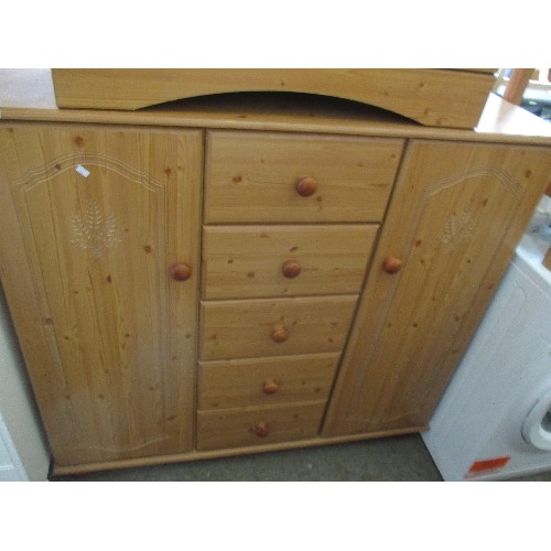 260 - PINE EFFECT CHEST OF FIVE DRAWERS WITH CUPBOARDS - CARVED DETAIL TO CUPBOARD DOORS - LOOSE FOOT FRON... 