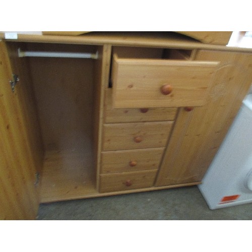 260 - PINE EFFECT CHEST OF FIVE DRAWERS WITH CUPBOARDS - CARVED DETAIL TO CUPBOARD DOORS - LOOSE FOOT FRON... 