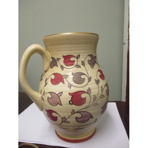 1 - AN ART DECO CROWN DUCAL CHARLOTTE RHEAD JUG, WITH TUBE LINED DESIGN OF LEAVES IN BURGUNDY AND GREY -... 