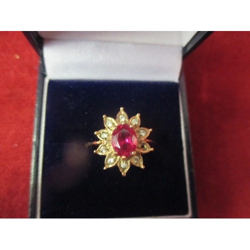 26 - 9CT GOLD DRESS RING WITH PRINCIPAL RED STONE AND WHITE STONES IN A FLOWER DESIGN, SIZE Q, 3.2 GRAMS,... 