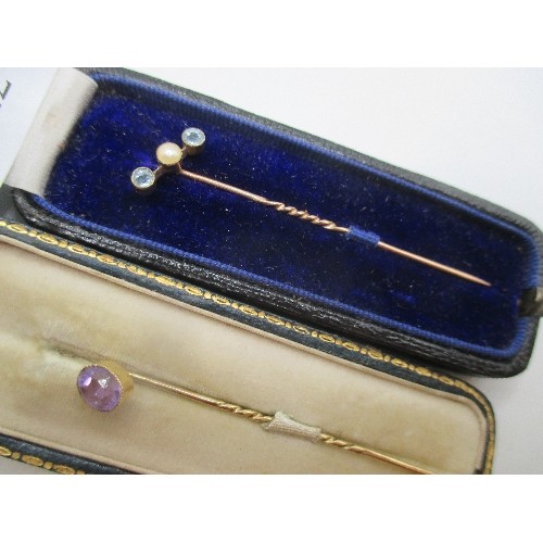 22 - TWO GOOD QUALITY VICTORIAN STICK PINS ONE MARKED 9CT GOLD WITH OVAL CUT AMETHYST IN A CARRINGTON & C... 