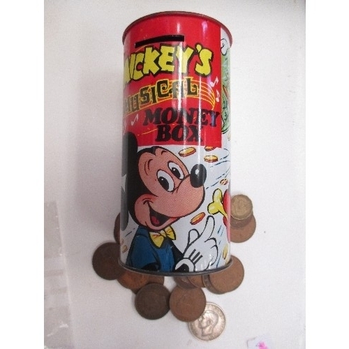 46 - AN EARLY MICKEY MOUSE MUSICAL MONEY BOX FULL OF OLD BRITISH COINS (SAMPLE SHOWN)