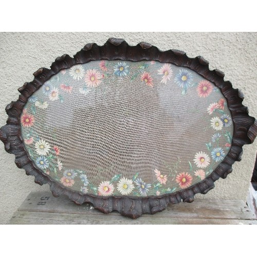 118 - LARGE ANTIQUE OVAL TRAY APPROX 86 X 58CM, VERY ORNATE WOODEN CARVED FRAME[SLIGHT DAMAGE ON ONE SECTI... 