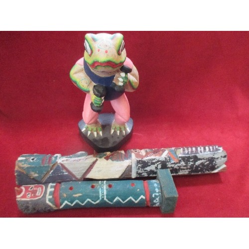 3 - A CARVED AND PAINTED WOODEN FROG WITH DUMBELLS AND TWO CARVED WOOD TOTEM POLES, THE LARGER ONE (A CA... 