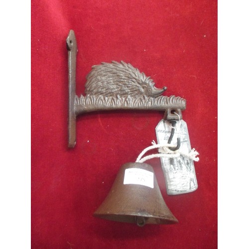 275 - WALL MOUNTED GARDEN BELL, [RUST EFFECT]METAL WITH HEDGEHOG BRACKET.