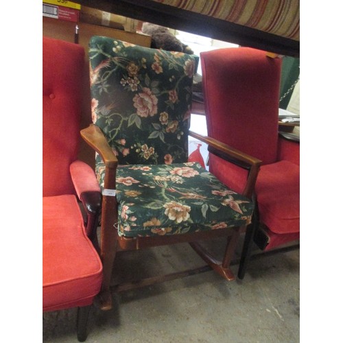 480 - A MID CENTURY PARKER KNOLL ROCKING CHAIR IN GREEN PATTERNED FABRIC