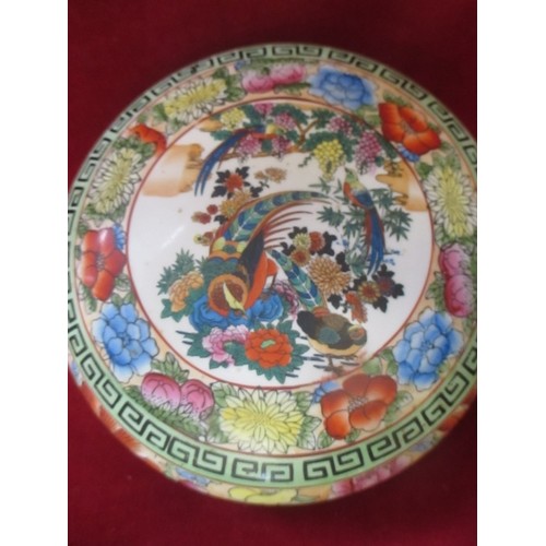 18 - LARGE ORIENTAL PORCELAIN BOWL DECORATED WITH FLOWERS AND PHEASANTS,  ON A CARVED STAND - 28CM DIA