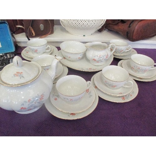 106 - VINTAGE TEA SERVICE, INCLUDES LARGE TEAPOT, CAKE PLATE & 6 TRIOS.